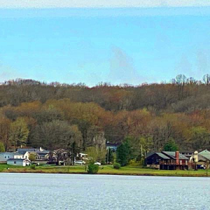 NEW LOT LISTING IN TREASURE LAKE WITH LAKE VIEWs FOR $10,000! If you are looking for the perfect spot to build your permanent or vacation home, this is it! Just a short walk to New Providence Beach and a boat launch. Call Elaine Rhodes at (814)375-11 photo