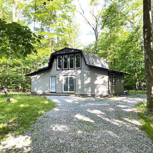 NEW LISTING IN TREASURE LAKE FOR ONLY $119,000! Completely renovated beach cottage with new metal roof, windows, and doors. Enjoy making meals while entertaining your guests in your updated, open kitchen with stainless steel appliances. Within walk photo